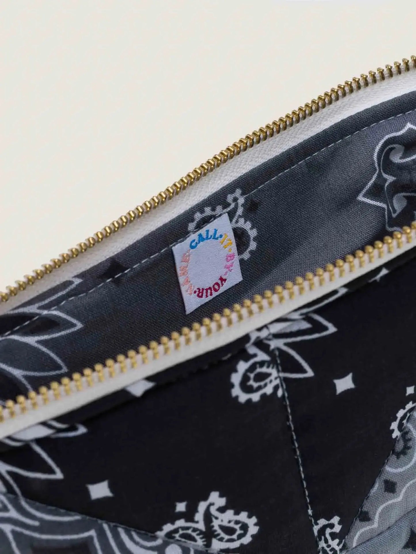 Call it by your name Zipped Quilted Pouch - Patchwork