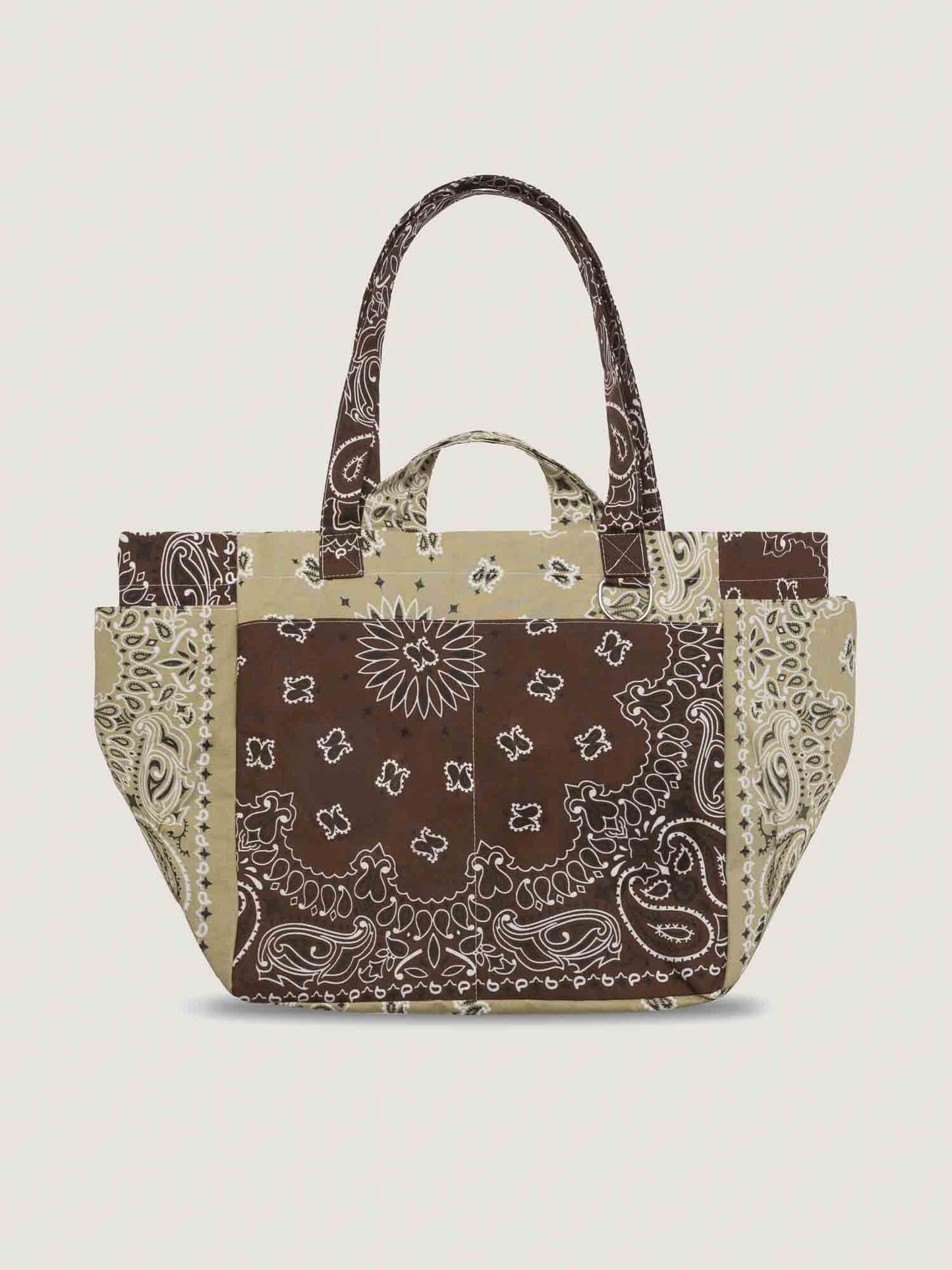 Tote bag with brown bandana pattern on a beige background, with inside and outside pockets, 2 handles and 2 shoulder straps, from brand Call it by your name