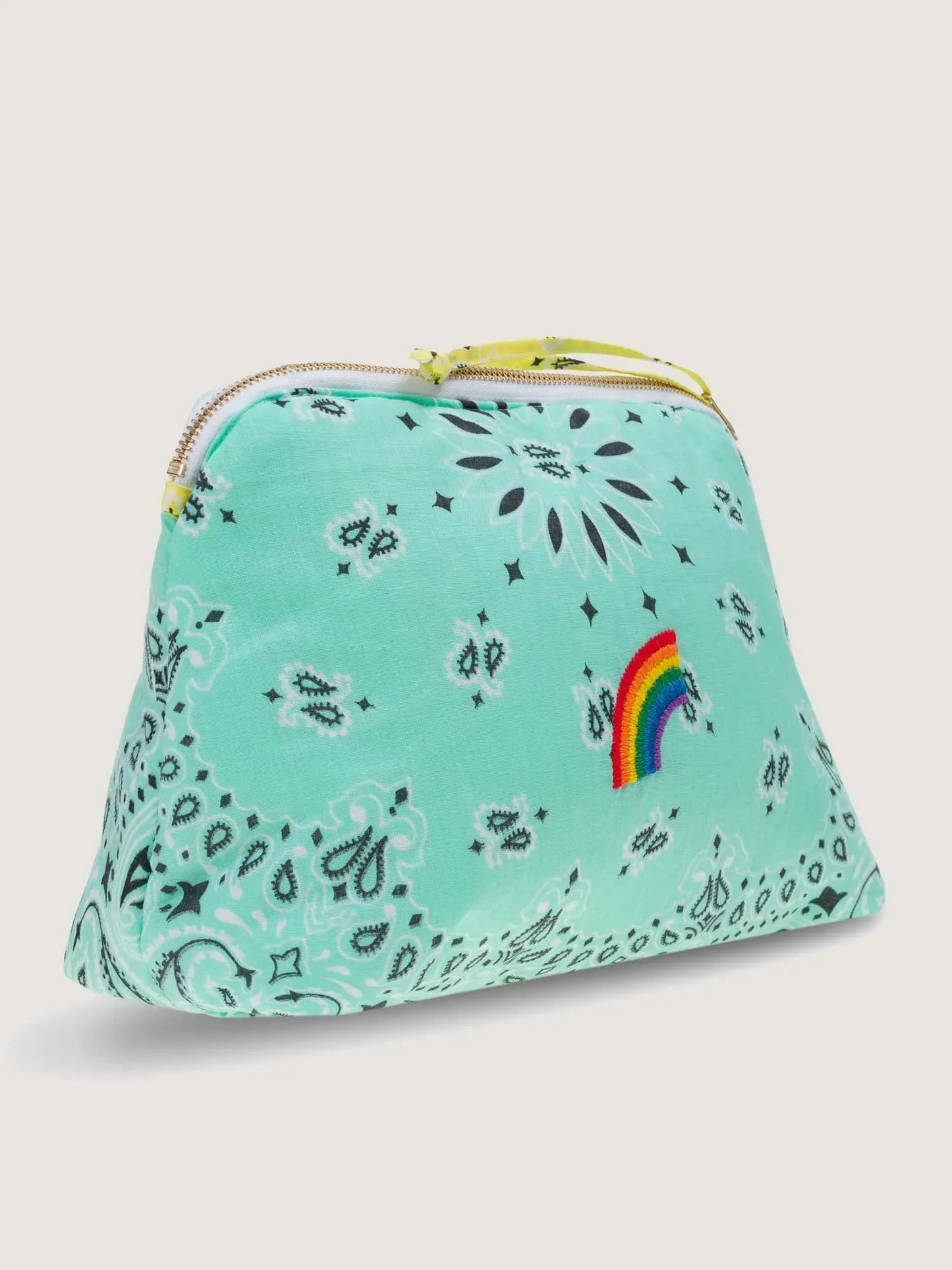 mint teal and yellow bandana toiletry case for makeup by call it by your name with a rainbow embroidery, side view
