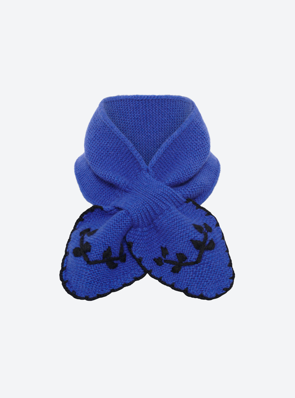 Flat-lay view of the Molli Dolce hand-embroidered mini scarf in ultramarine blue with deep black embroidery