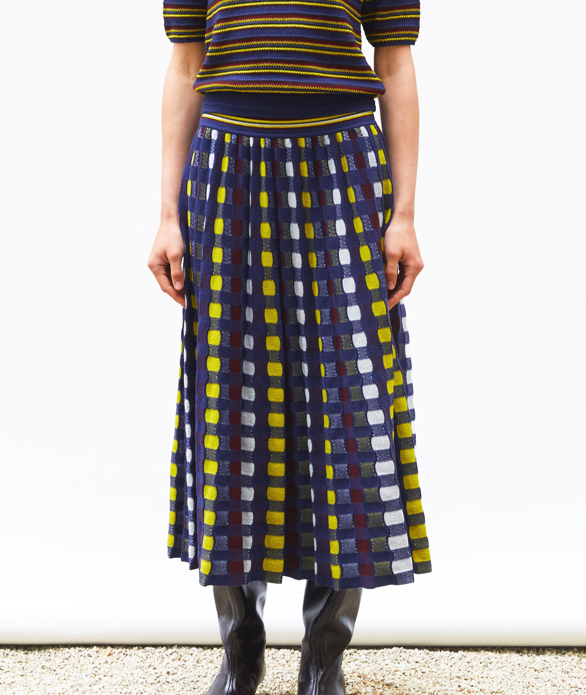 A checkered skirt with a white background
