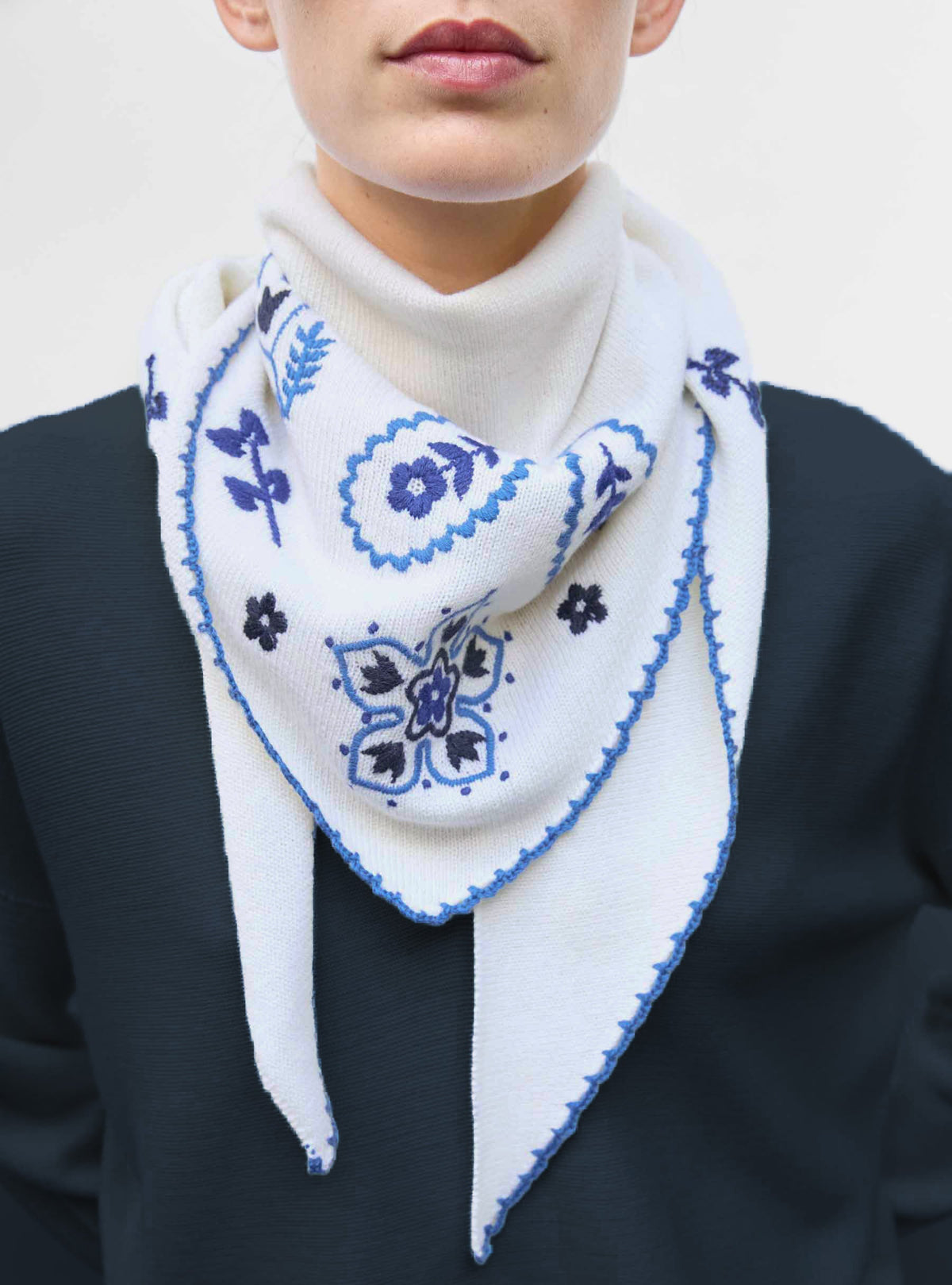 Molli Fantastique embroidered bandana worn with a natural knit top and natural knit pants