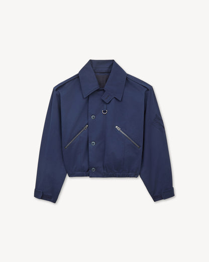 Kenzo cropped military bomber in blue black cotton twill with button flap, zipped front pockets and epaulettes, front view