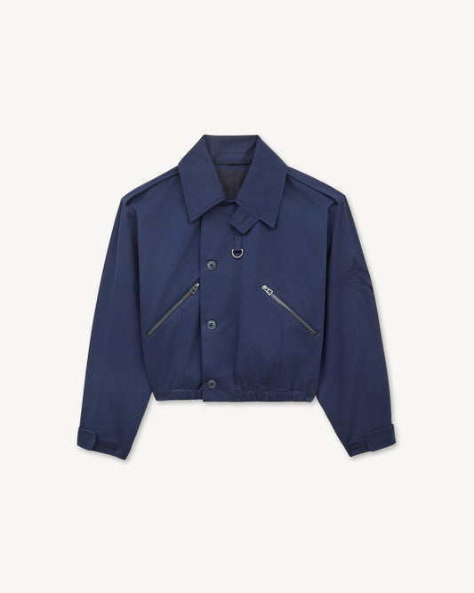 Kenzo cropped military bomber in blue black cotton twill with button flap, zipped front pockets and epaulettes, front view