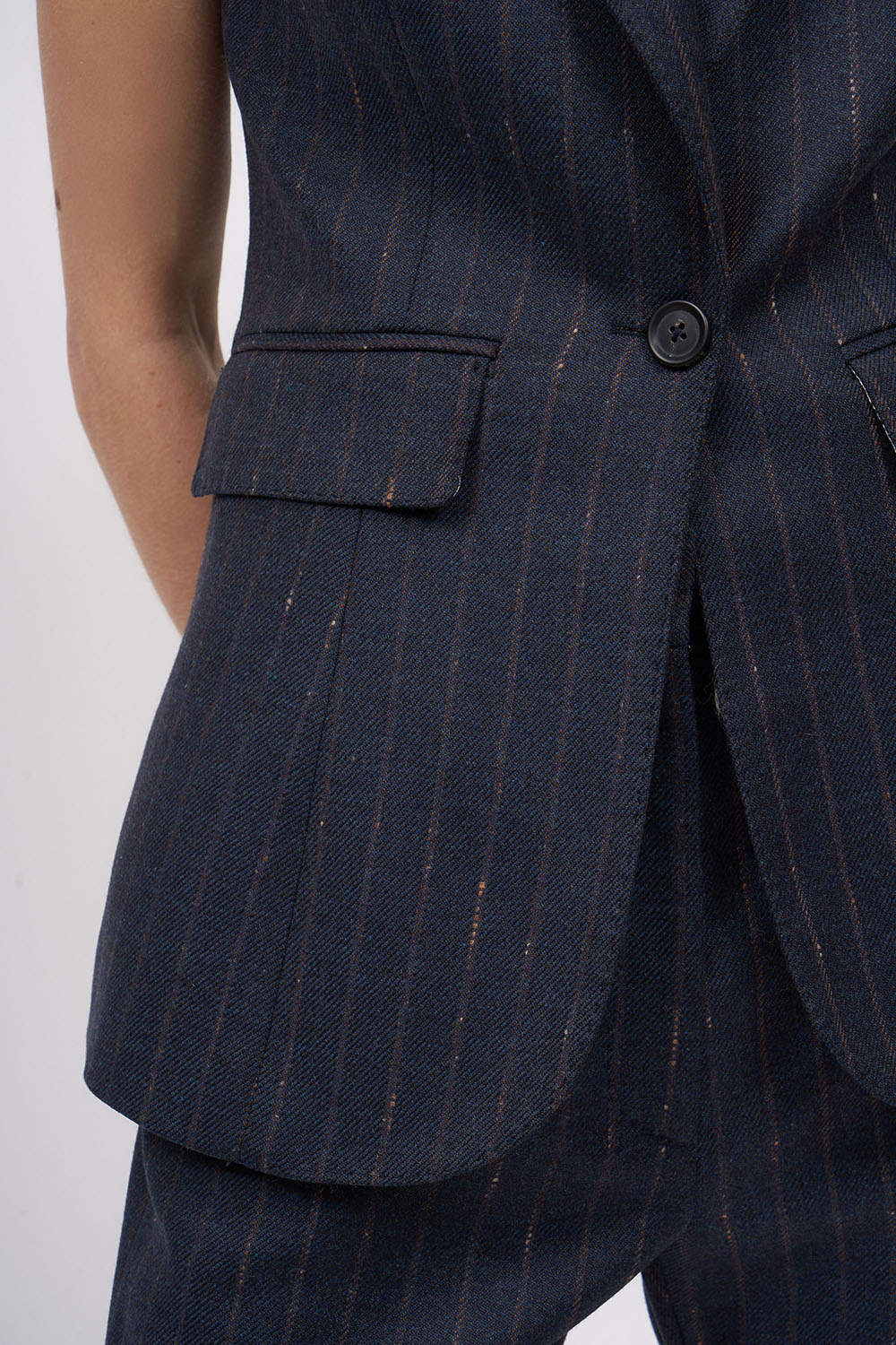 Detail of the flap pocket on the Paul & Joe Amy navy striped wool vest