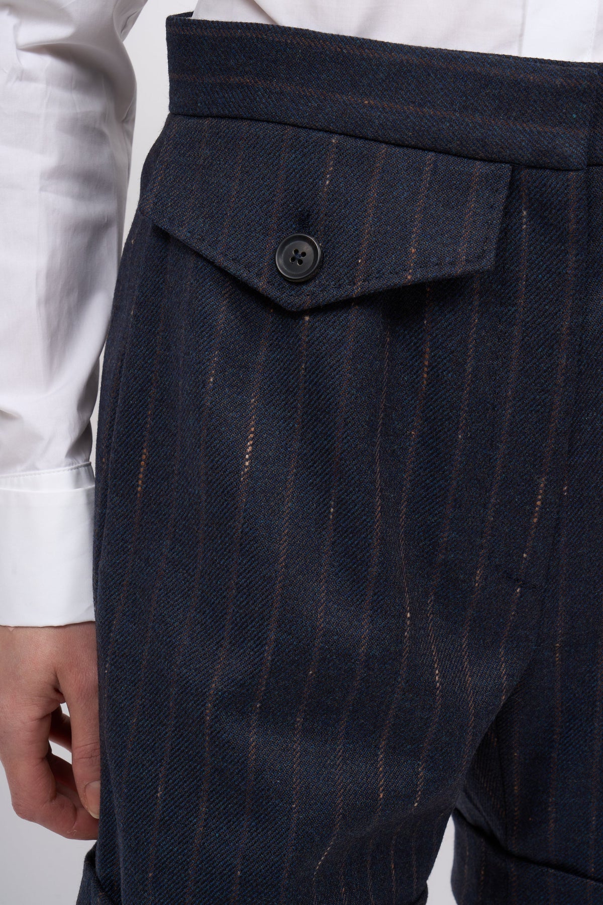 Close-up of the flap pocket on the Paul & Joe Anya navy pinstripe shorts