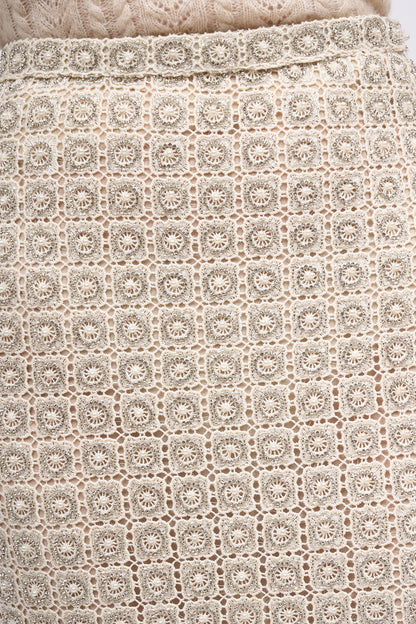 Close-up of the hand-embroidered cotton guipure lace on the Paul & Joe Diamant skirt