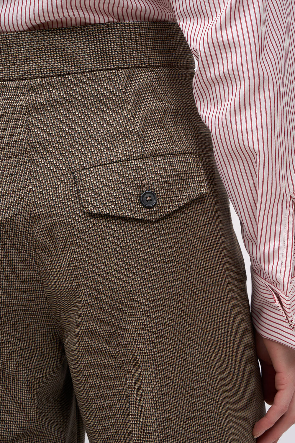 Close-up of the back flap pocket on the Paul & Joe Eva houndstooth wool trousers