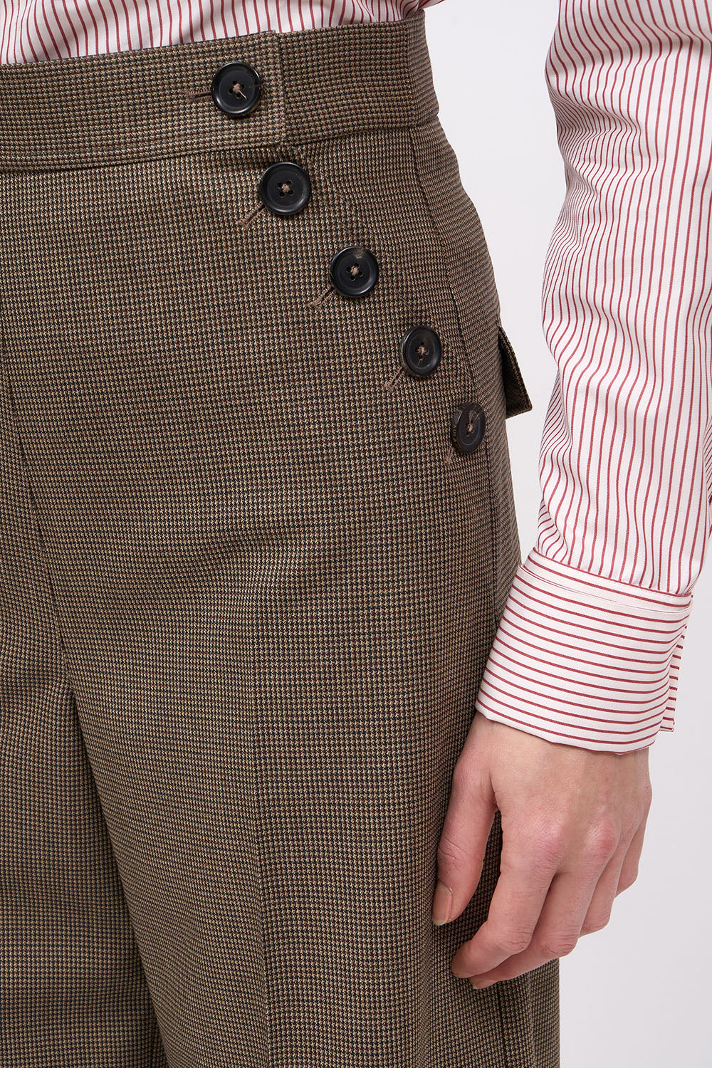 Detail of the horn buttons on the front flap of the Paul & Joe Eva houndstooth trousers