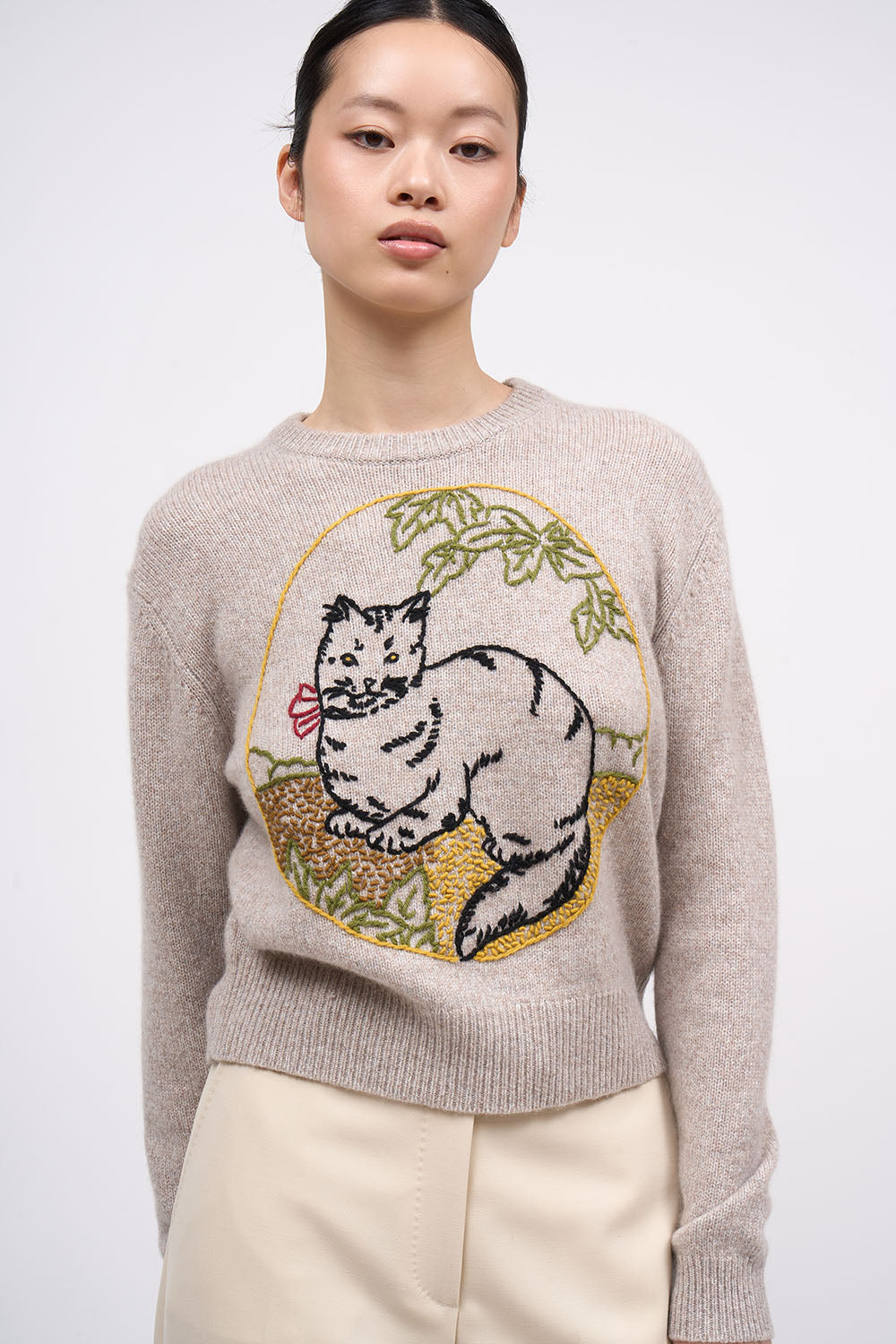 Paul & Joe Gattino chamois cashmere sweater worn with cream trousers