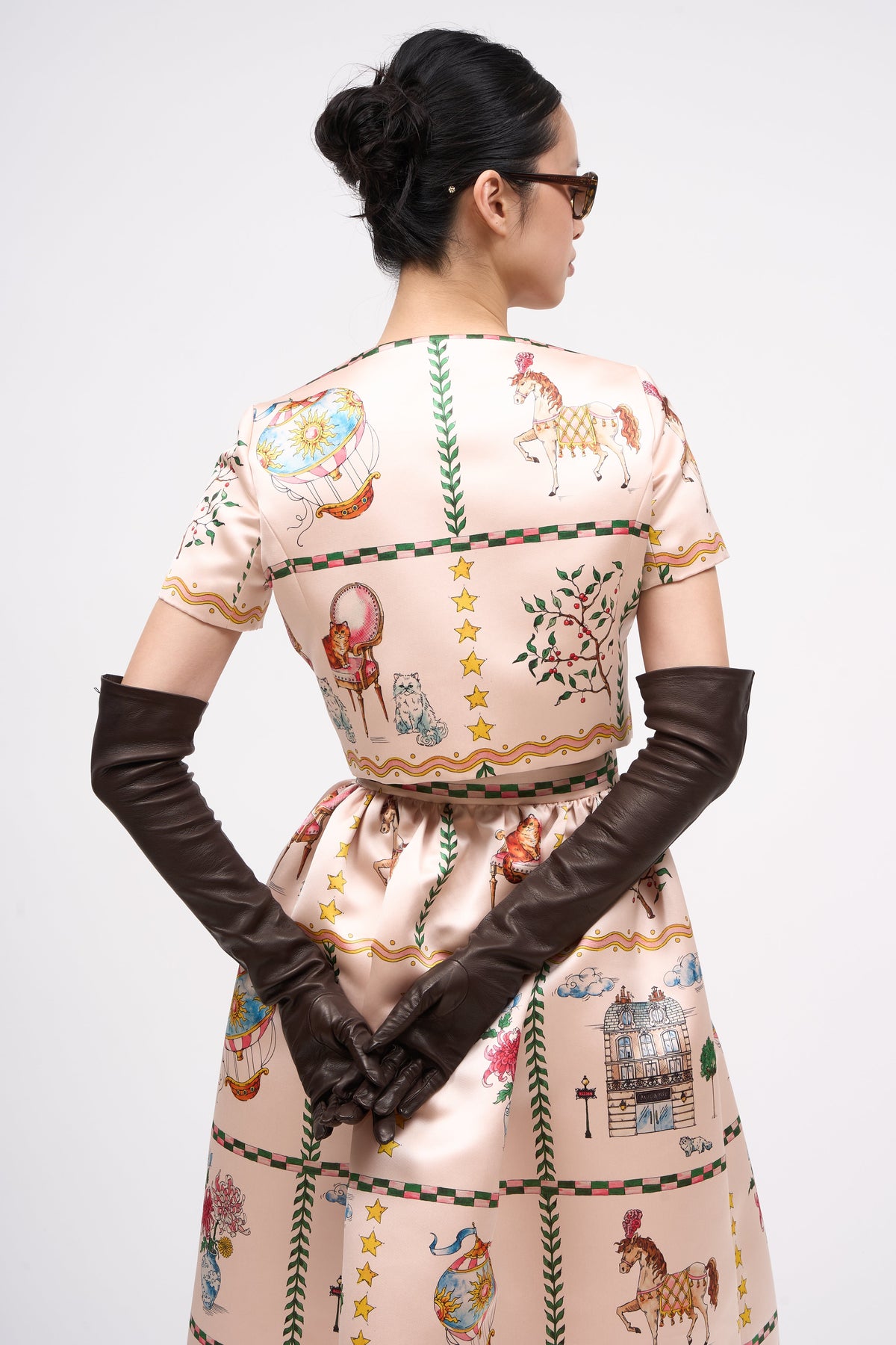 Back view of the Paul & Joe Voyage printed satin short jacket