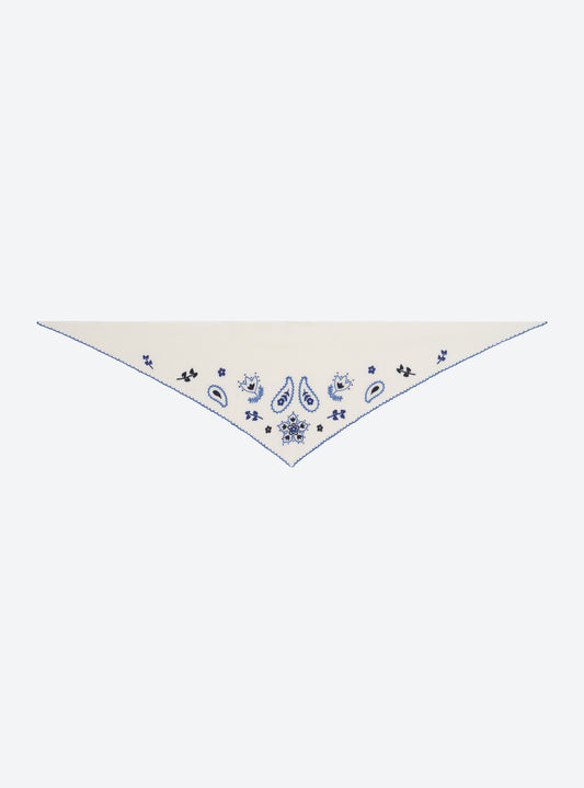 Flat-lay view of the Molli Fantastique natural knit bandana with multicolor and blue embroidery