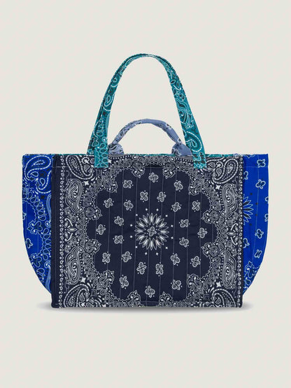 Blue and navy bandana maxi tote bag quilted with patchwork pattern, with 2 handles and shoulder straps, lightweight, great for travel, by Call it by your name, back view