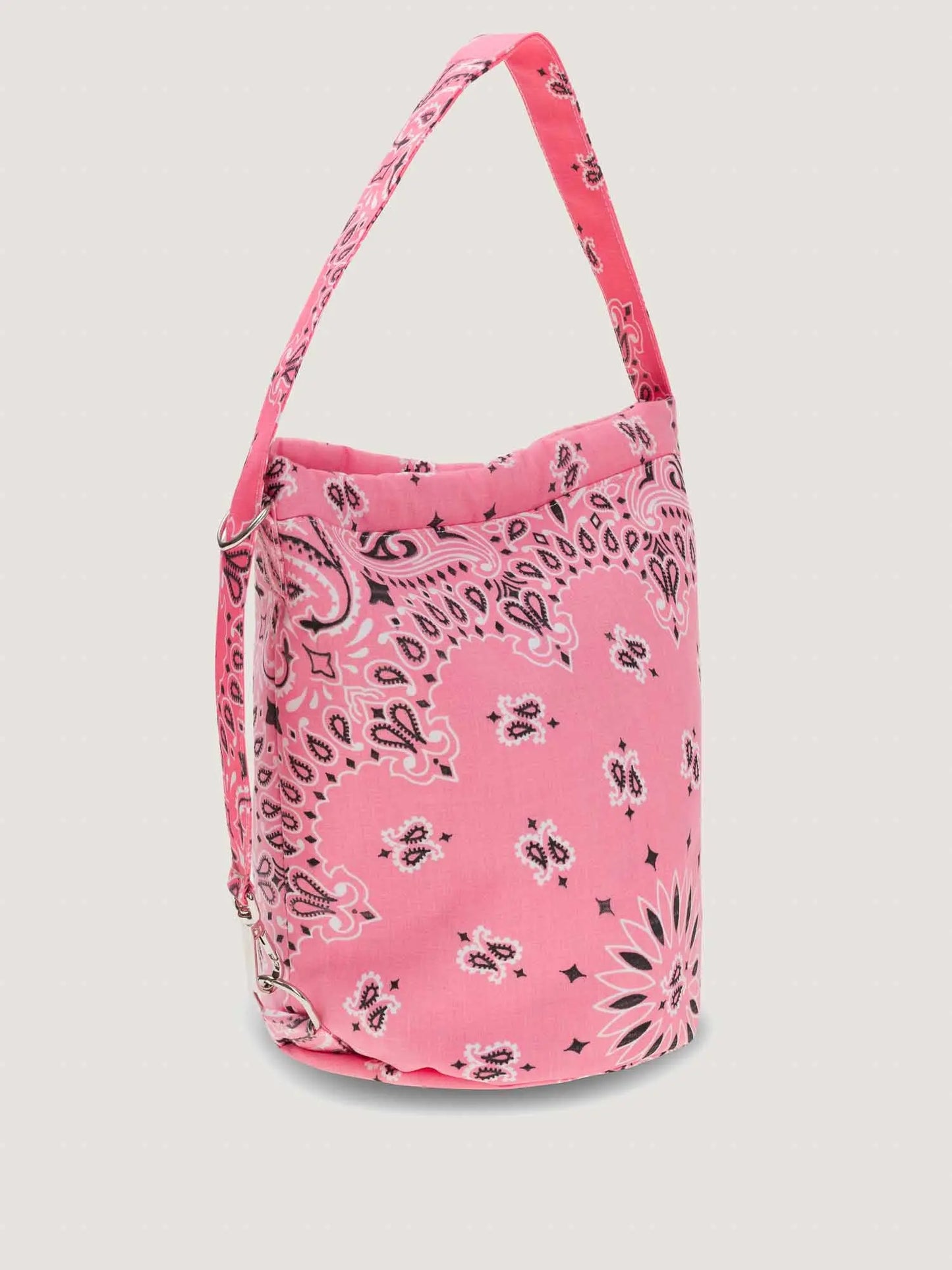 Pink bandana bucket bag with adjustable strap by brand call it by your name, side view