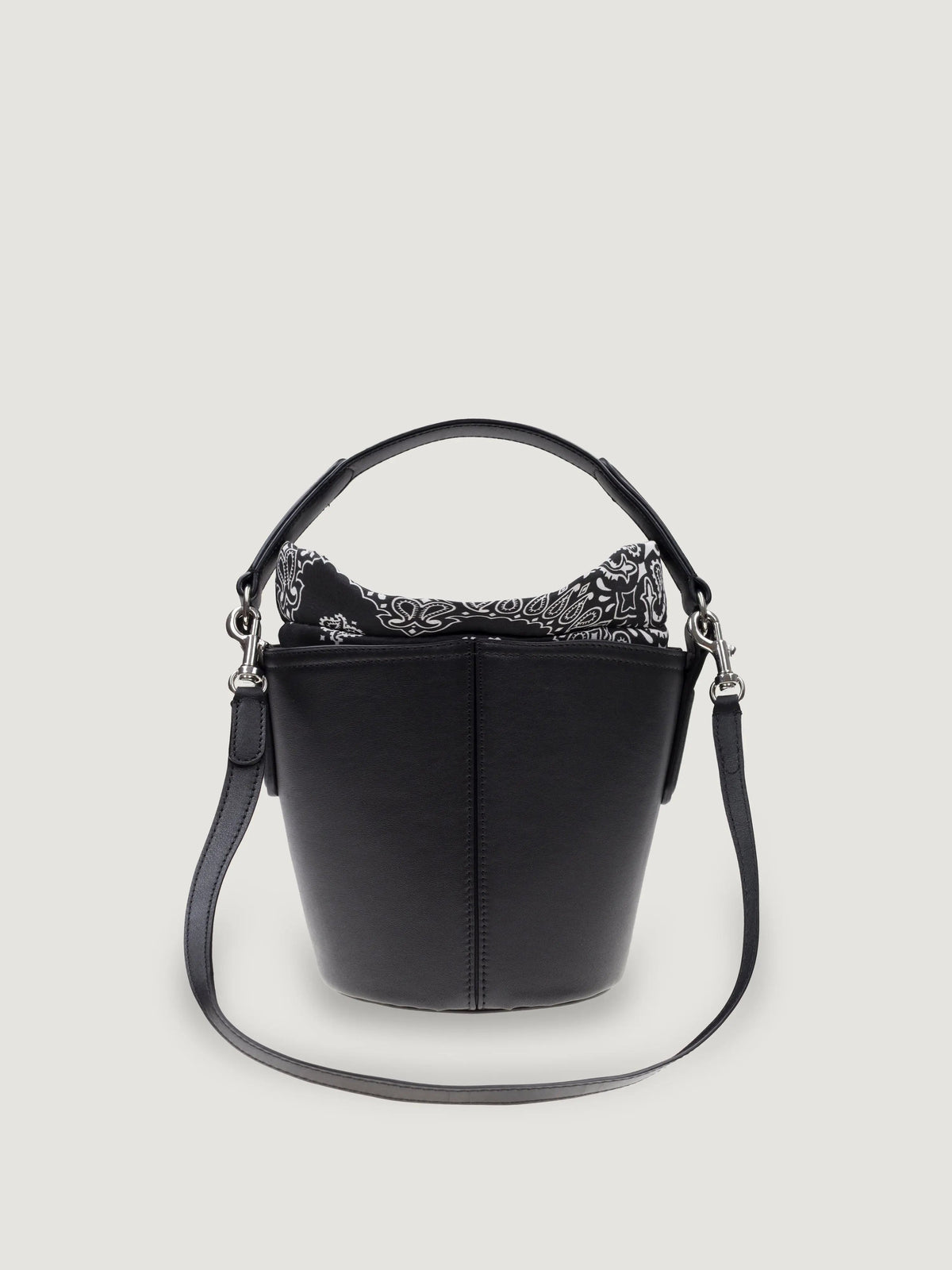 Front view of the Call It By Your Name mini Peekaboo leather bucket bag in black with its shoulder strap