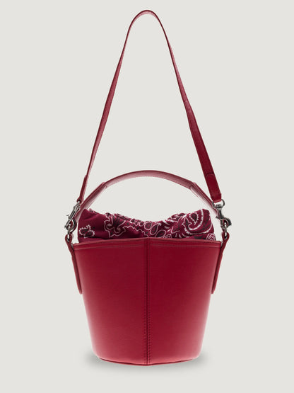 Call It By Your Name mini cherry Peekaboo bag with the shoulder strap raised