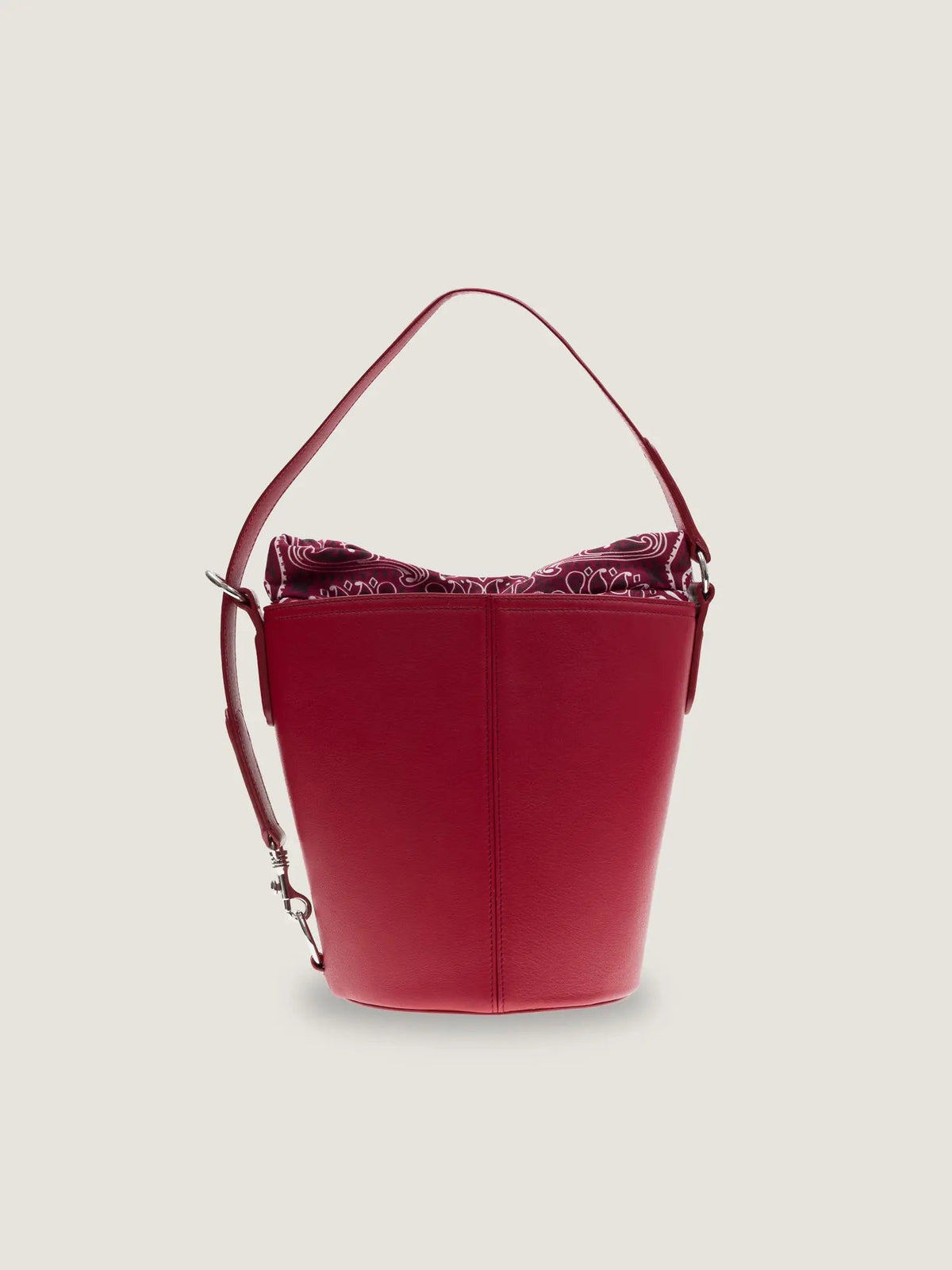 Front view of the Call It By Your Name medium Peekaboo leather bucket bag in cherry
