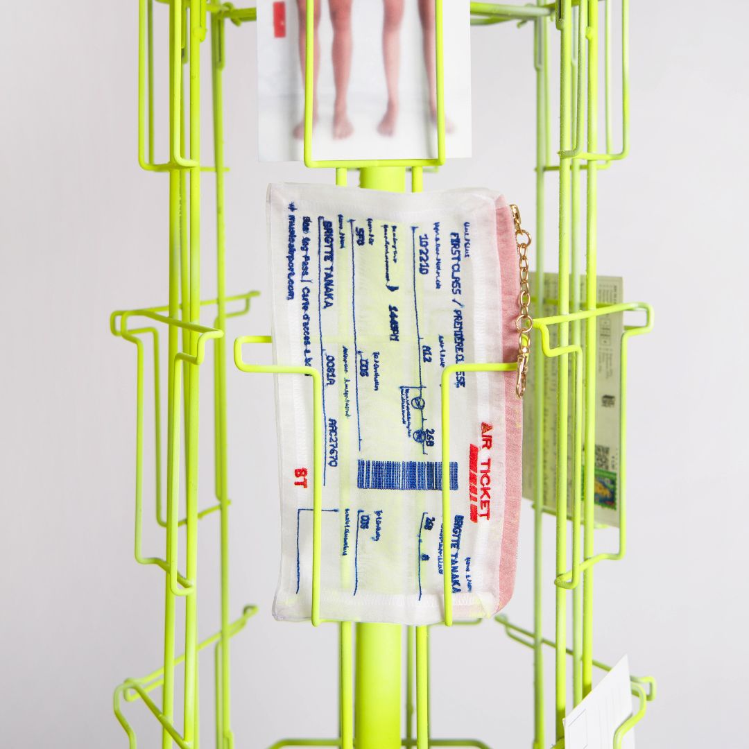 Brigitte Tanaka Air Ticket pouches displayed on a rack