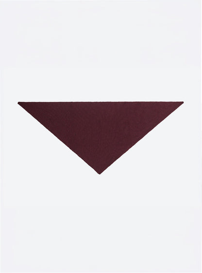 Flat-lay view of the Molli Frais fine-knit triangle scarf in amaranth