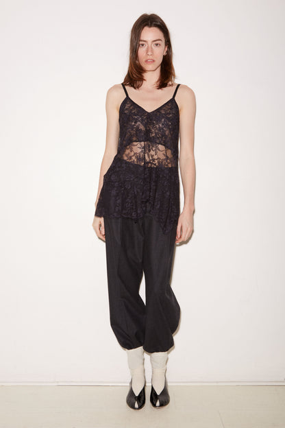 Roseanna Latte navy lace camisole styled with black trousers, full-length view