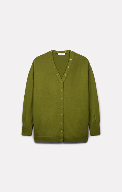 Flat-lay view of the Roseanna Lucia moss cardigan with snap buttons and R embroidery on the sleeve