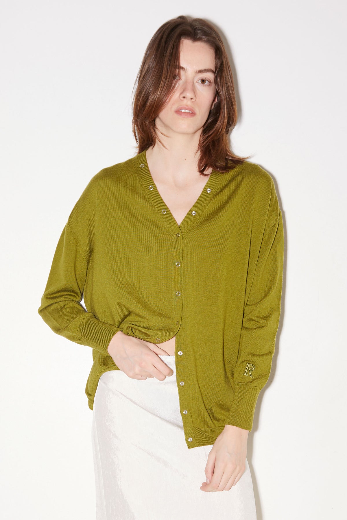 Front view of the Roseanna Lucia moss green merino wool V-neck cardigan
