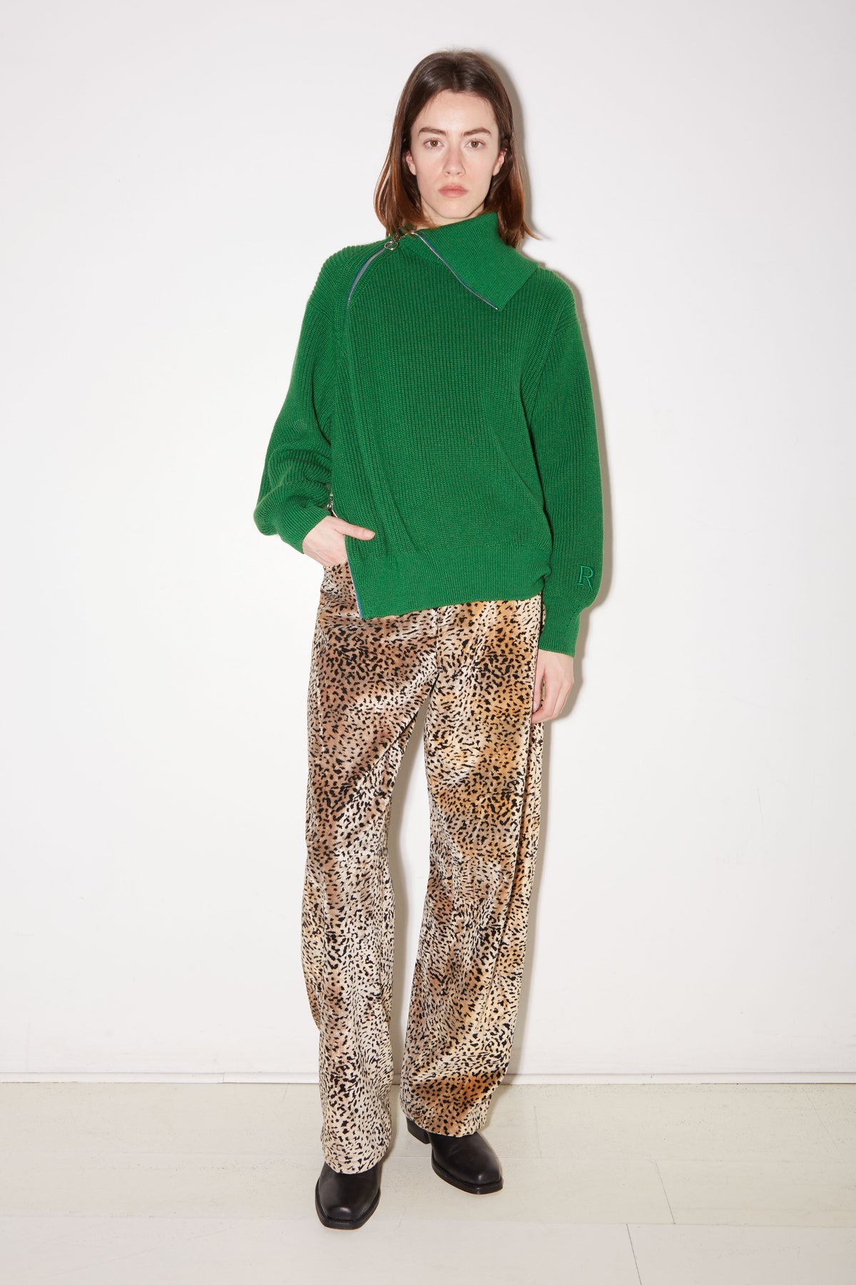 Roseanna Zip green sweater styled with printed trousers, full-length view
