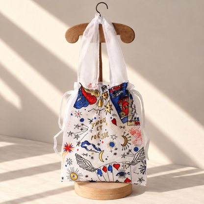 Back of the Brigitte Tanaka x Moulin Rouge white tarot tote with colorful embroidery