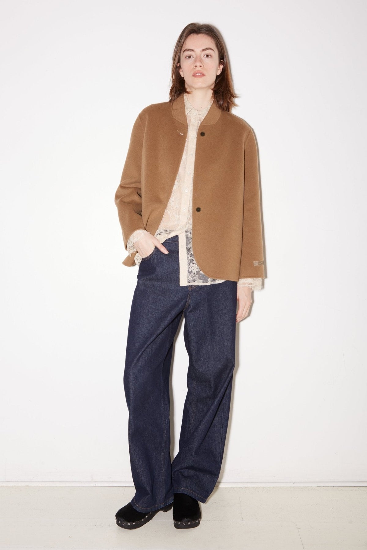 Roseanna Kaia beige oversized wool jacket styled with dark wide-leg jeans, full-length view